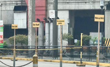 Poveda’s new drop-off signs say “Wake up CHILD”