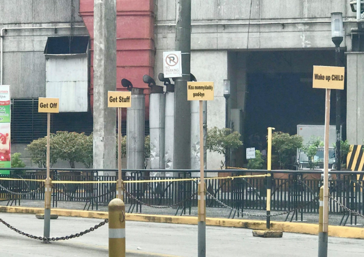 Poveda’s new drop-off signs say “Wake up CHILD”