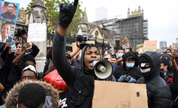 John Boyega proves he’s a hero IRL too at this #BlackLivesMatter protest